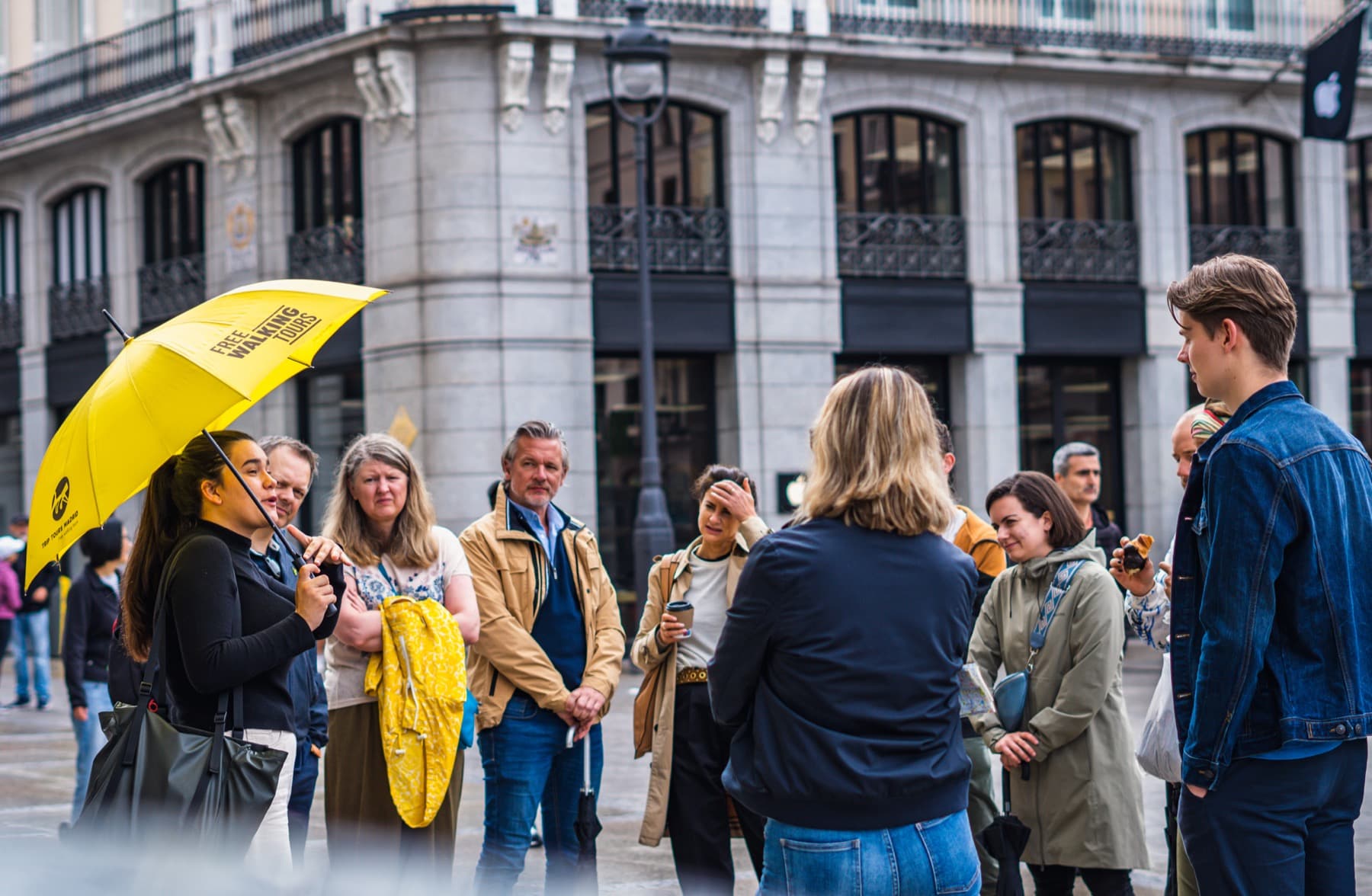 Happy travellers on a Trip Tours Madrid free walking tour through central Madrid